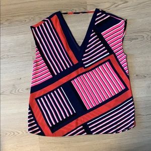 Here patterned v neck blouse